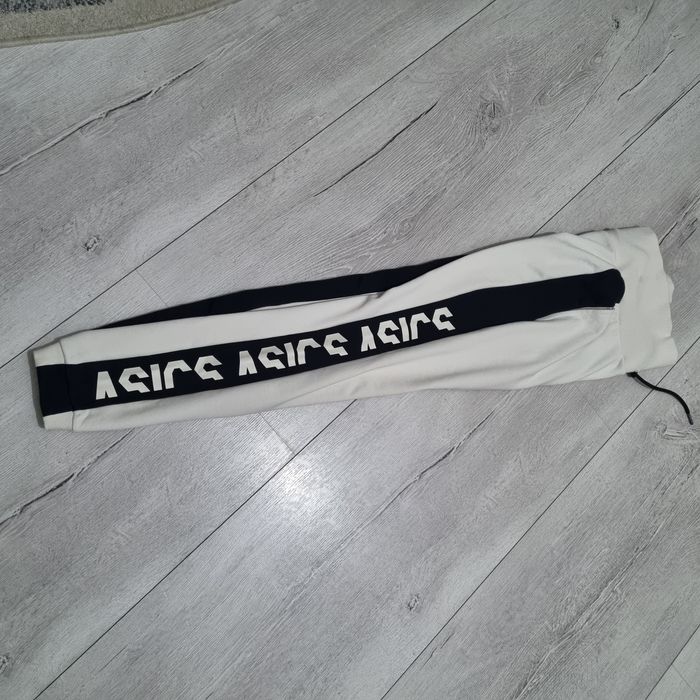 Pantaloni de trening ASICS FEMEI
