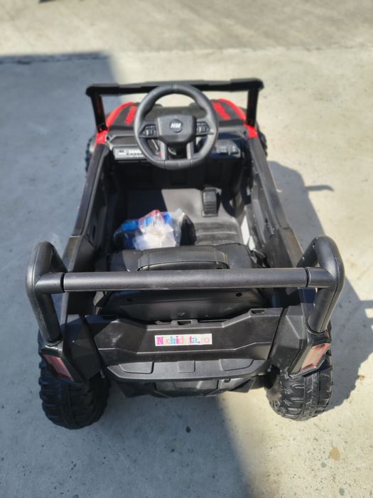 Masinuta electrica de teren pentru copii Nichiduta Off Road UTV Talon i-4WD Red cu telecomanda,acumulator 12V,scaun din piele,slow start,suspensii