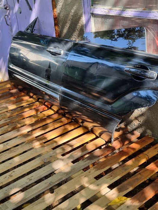 Двери на Subaru Forester Sg Sg  .