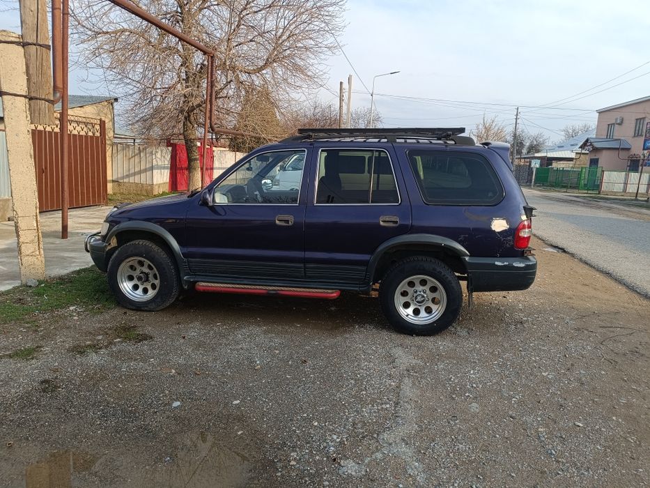 Автомобиль киа спортейж