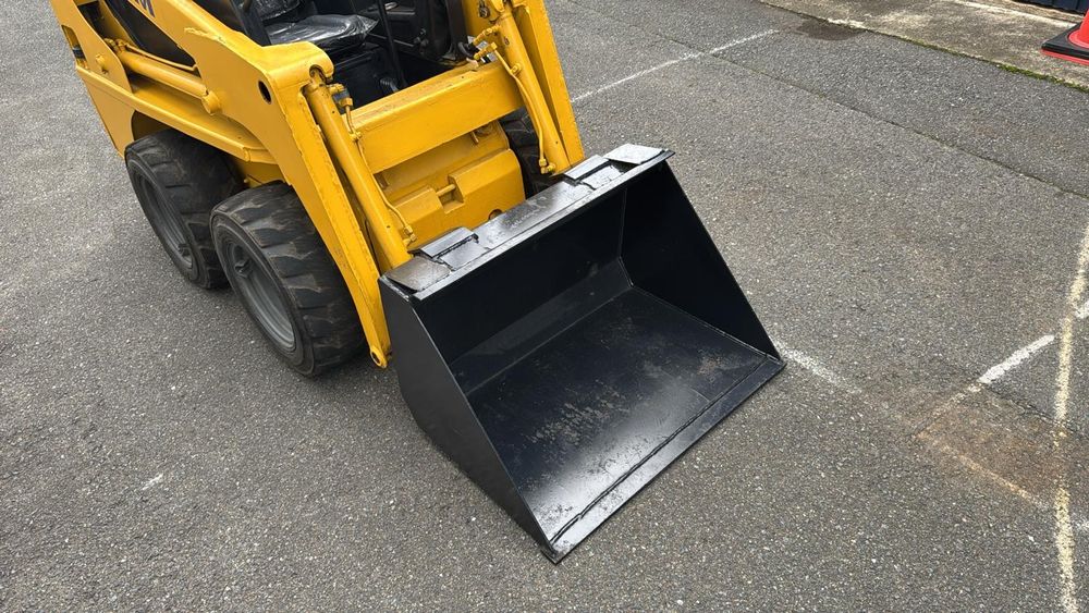 TCM Bobcat 604 погрузчик
