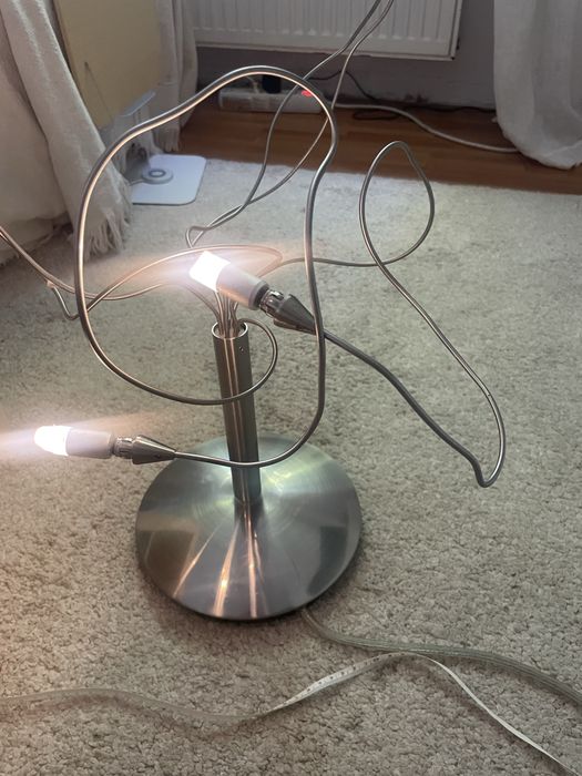 Lampa din  inox cu 6 brate modelabile.