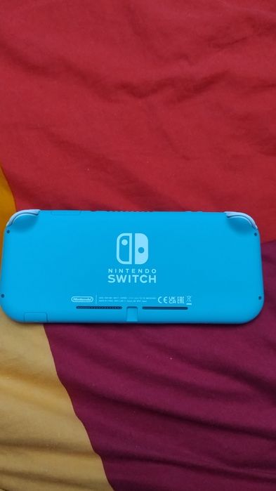 Nintendo Switch Lite – ca nou. Folosit de 3 ori, stare impecabilă.
