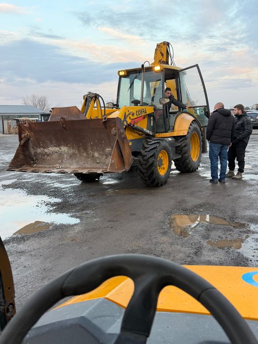 Услуги с комбиниран багер