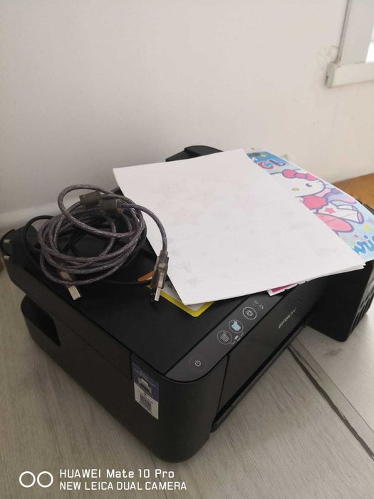 Epson L3200: заправлен и готов к работе