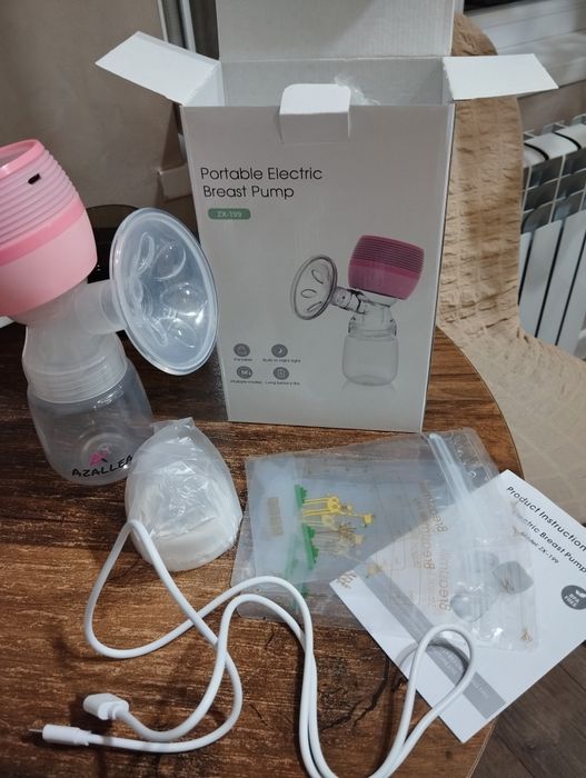 Продам молокоотсос электрический