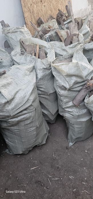 Готовые дрова в мешках