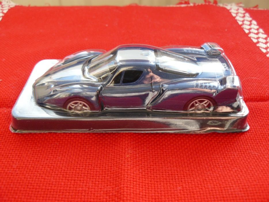 Macheta Auto FERRARI FXX Noua,Metalica,Scara 1:43,Produs De AmerCom
