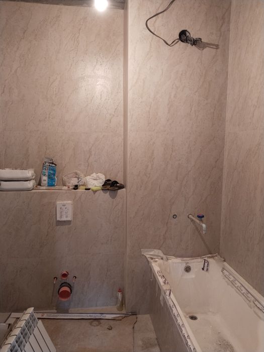 Кафельшик плиточник