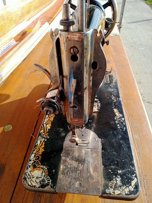 Mașină de cusut Singer