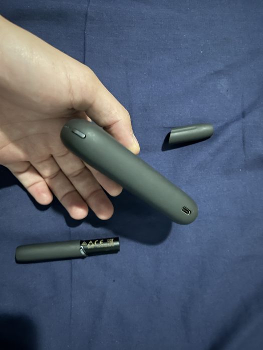 IQOS , tigara electronică.