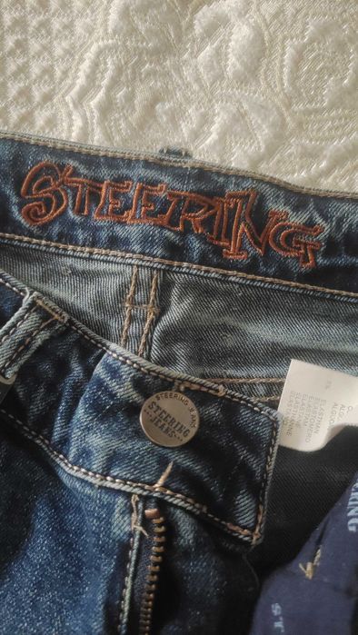 Джинсы STEERING рваные