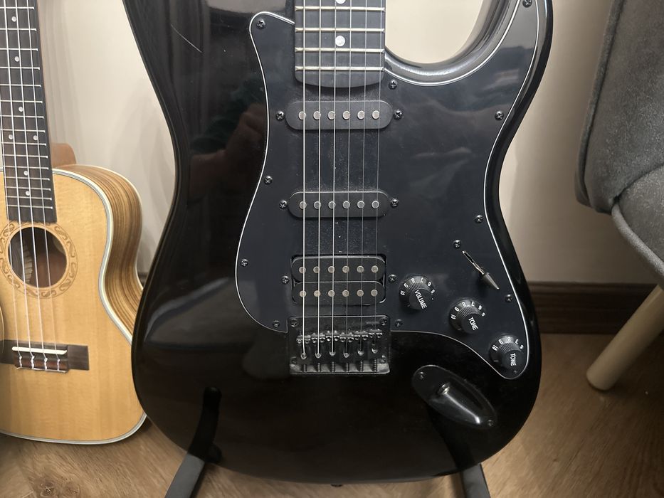 Гитара с комбоуселителем