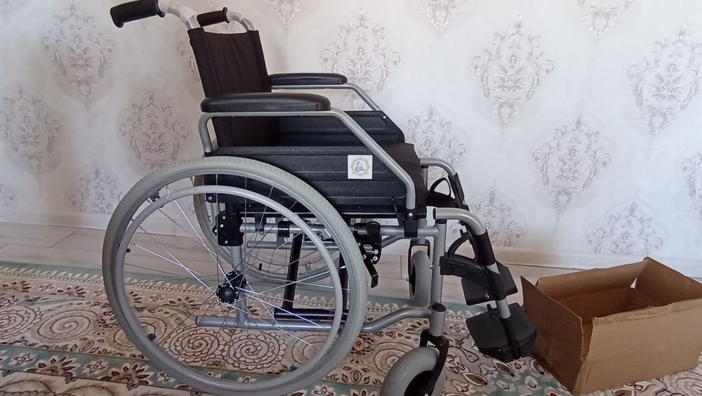 Инвалитны коляска жана