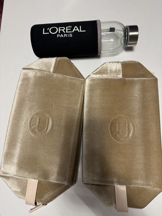 Козметичен несесер и бутилка Лореал