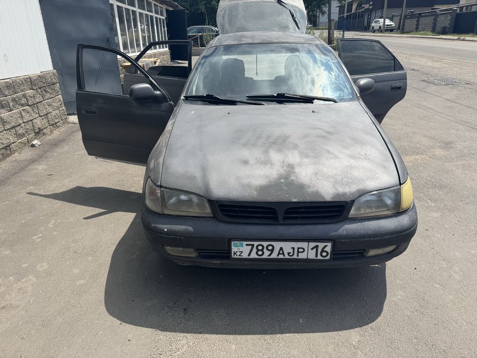 Тайота карине е