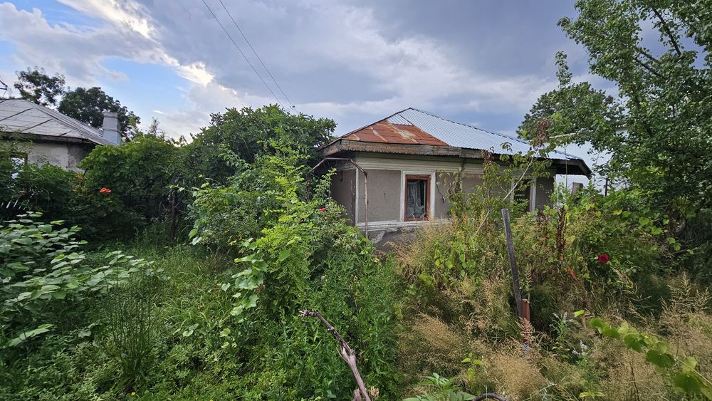 Casa batraneasca + teren intravilan Surdulesti