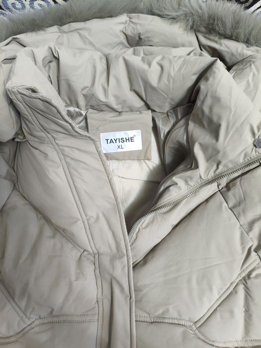 Продам куртка пуховик новый