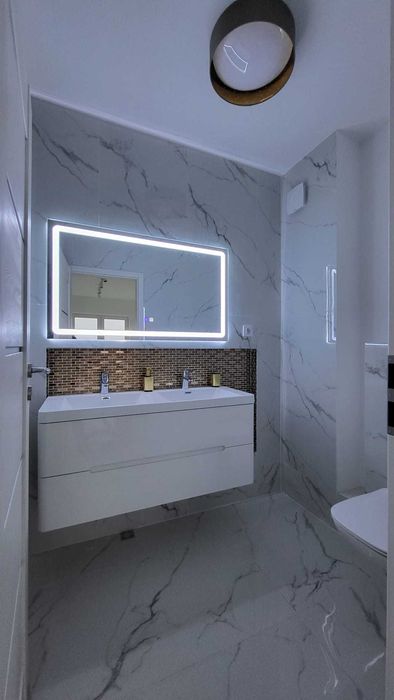 Finisaje constructii placari gipscarton, gleturi, placari ceramice