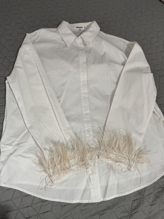 Бяла риза с пера
