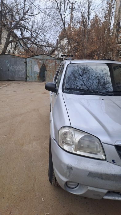 Мазда трибют 2,3