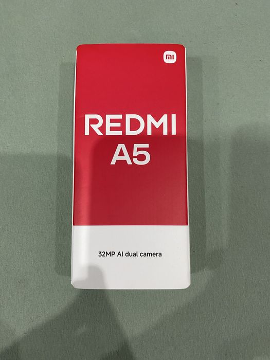 Xiaomi Redmi A5.     V