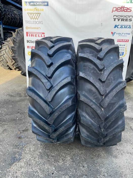 Cauciucuri noi 16.9-24 cu 10 pliuri marca OZKA pentru tractor fata