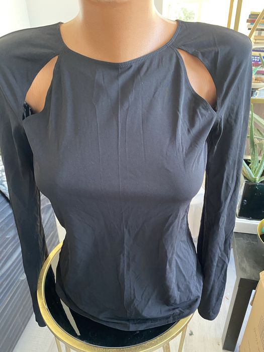 Top  dama  cu decupaje si maneci desfacute