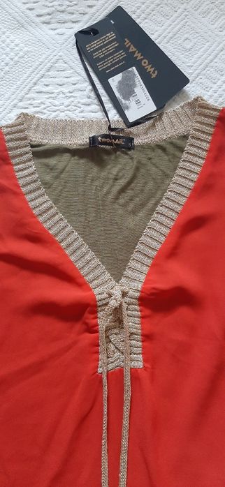 Bluza maneca scurta. Marimea S dar este mai mare