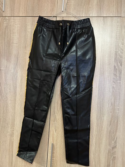 Дамски кожен екип