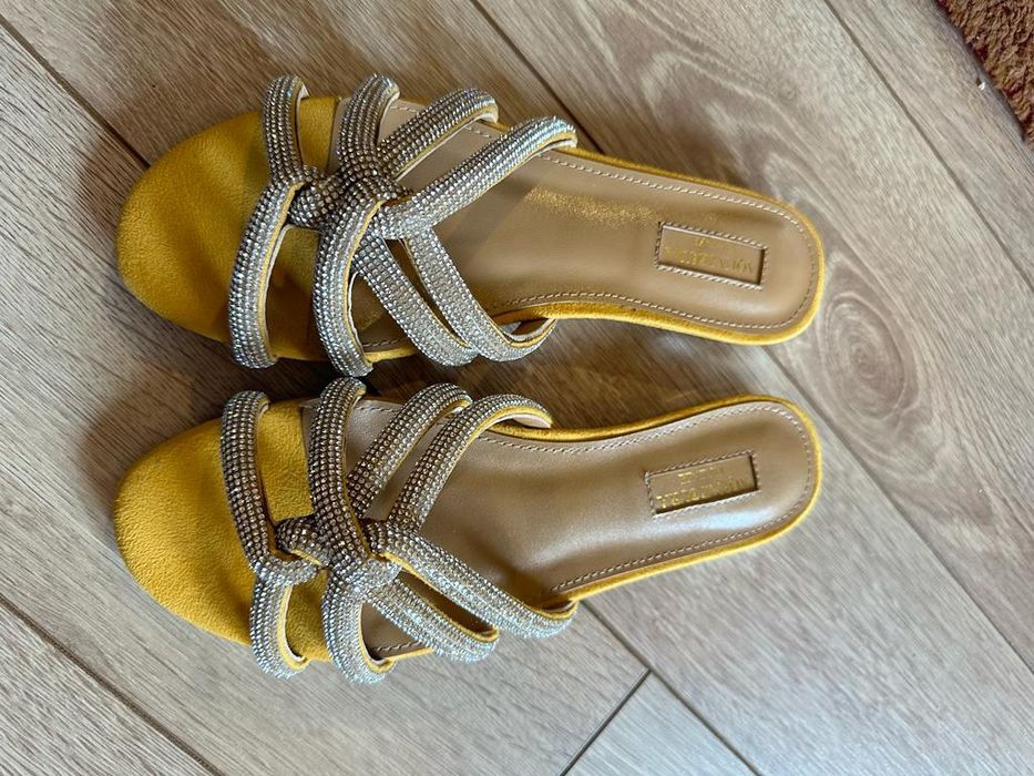 Gucci Amina Muaddi Alexander Wang Louis Vuitton