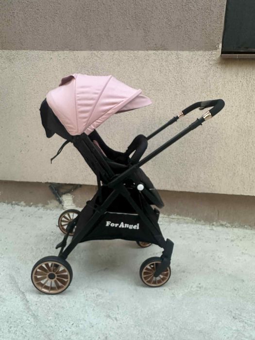 Carucior sport cu pozitie de somn si mâner reversibil, tip troller