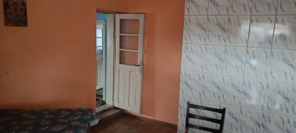 Casă bătrânească și teren in Tomești