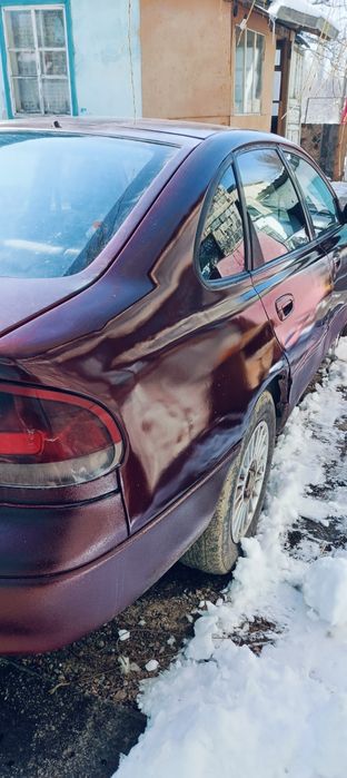 Машина Мазда кронус