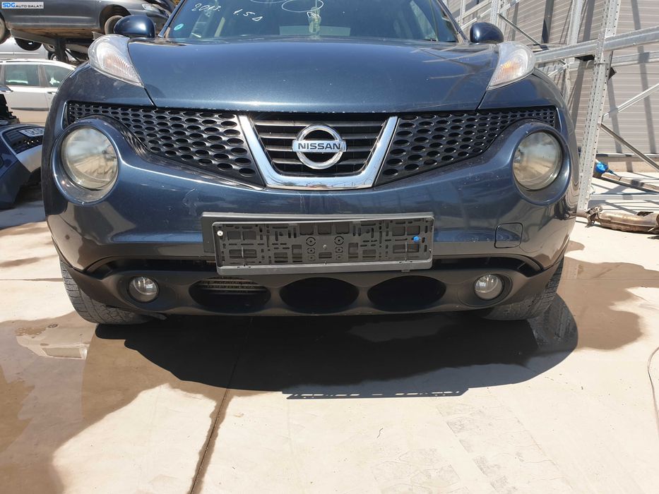 Bara Spoiler Fata cu Proiectoare FARA Grila cu Emblema Nissan Juke F15 NFL Non Facelift 2010 - 2014 Culoare RAQ [K6302]