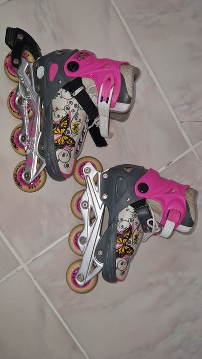 Коньки роликовые