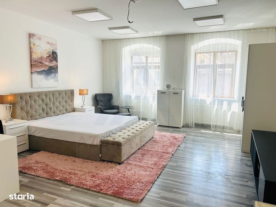 Studio modern 50 mp prima închiriere cu parcare in zona Centrala — fotografia 1