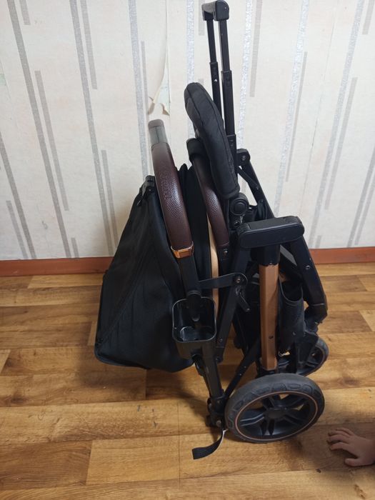 Коляска teknum  сатылады.