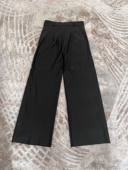 Кожанные брюки широкие