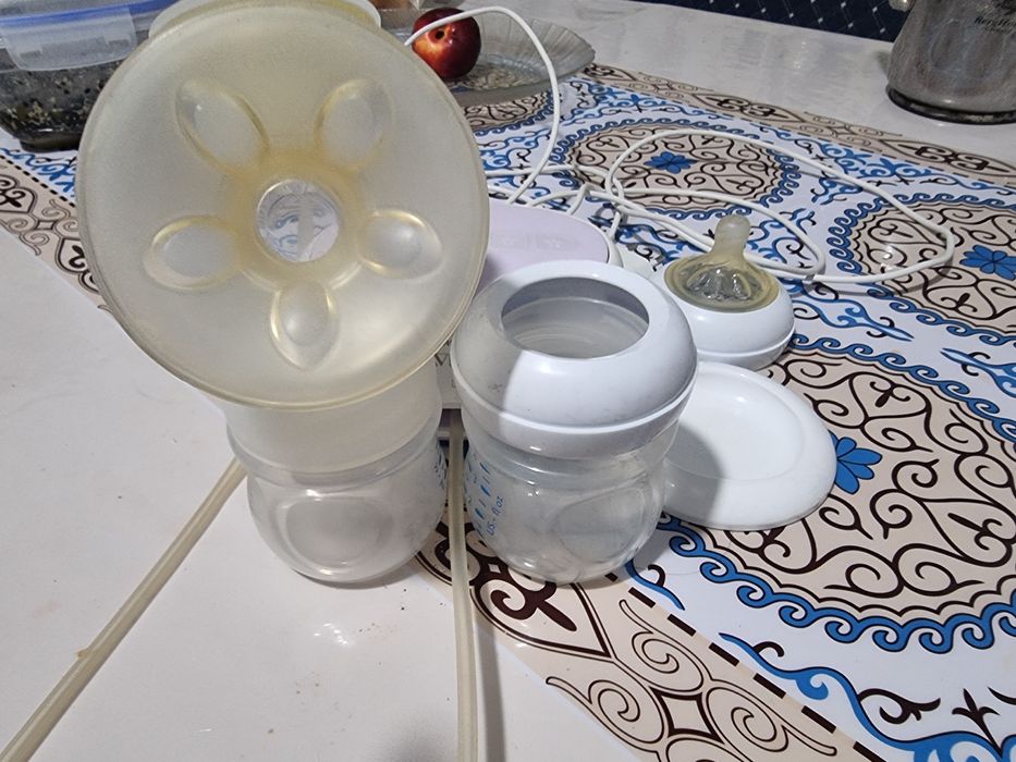 Продам молокоотсос электрическии