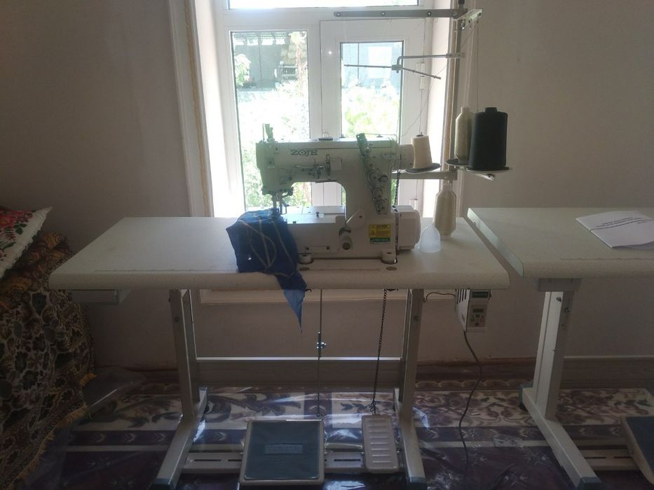 Zoje tikuv mashinka. Yangi