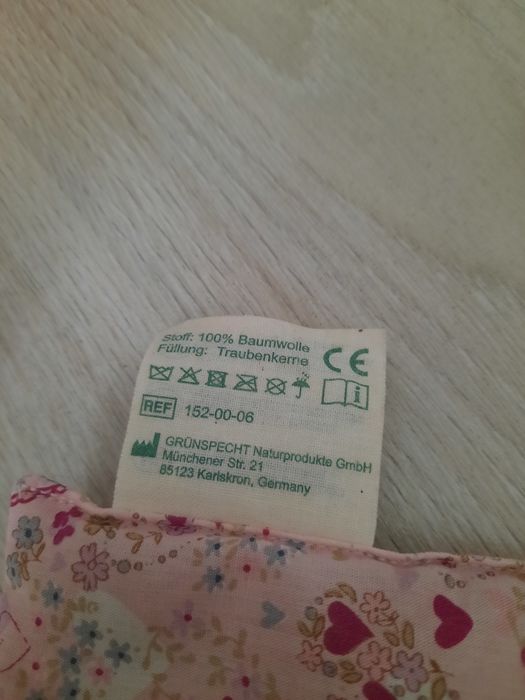 Възглавница с гроздови семки против колики и шише за хранене