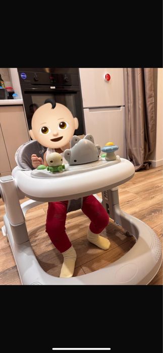 Ходунок для детей серего цвета