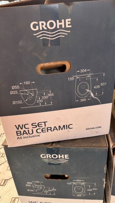 Новый унитаз GROHE ,с крышкой