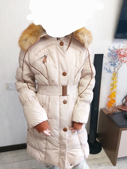 Продам пуховик теплый