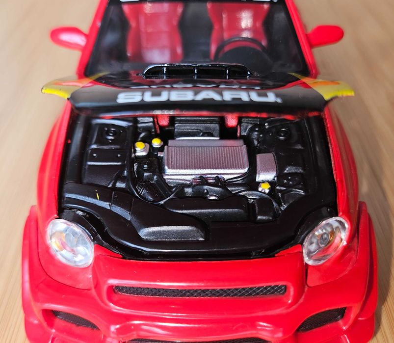 Masina de colectie Bburago Subaru Impreza WRX la scara 1/24 din metal