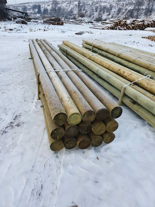 Stalpi pentru linii aeriene de cablu din lemn calibrat si tratat