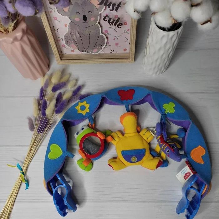 Музыкальная дуга на коляску от Tiny Love