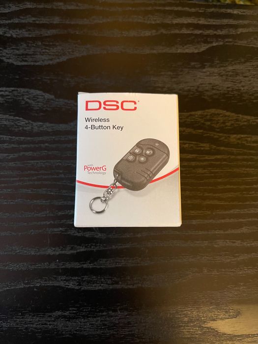 Telecomanda sistem alarma cu 4 butoane DSC seria Neo.