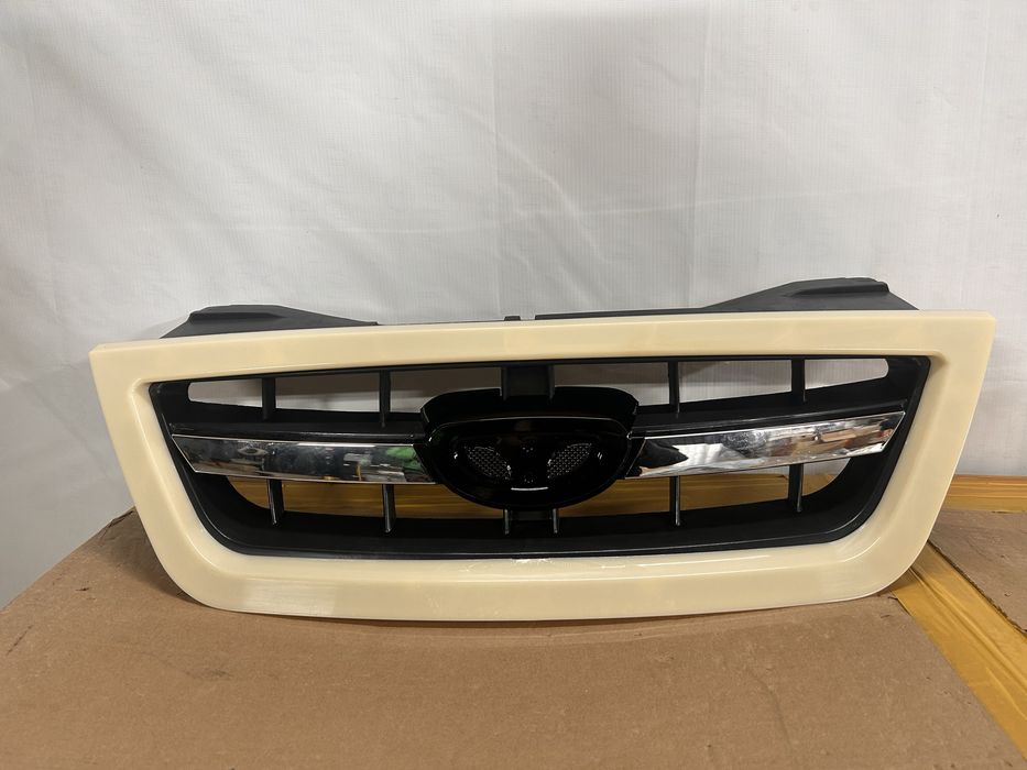 DAEWOО NEXIA Решетка+значок